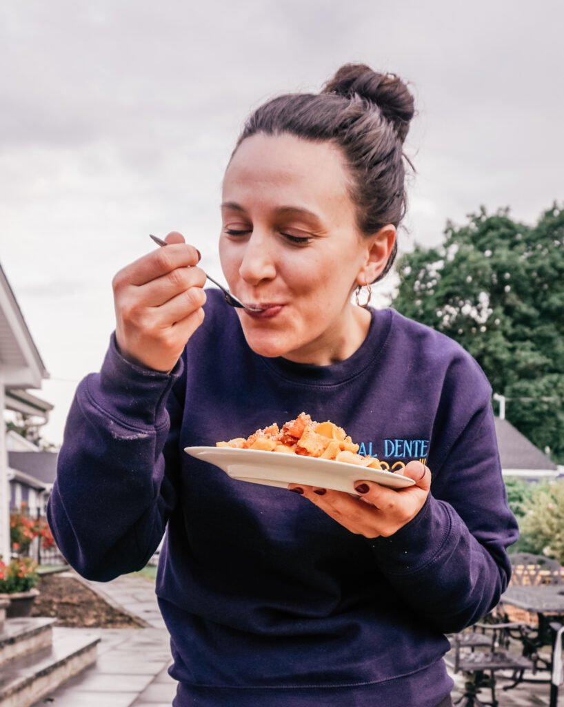 francesca eating grilled tomato sauce with pepperoni and tagliatelle